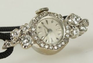 Juvenia 14k Gold Ladies Swiss Made Watch Incrustated with Diamonds