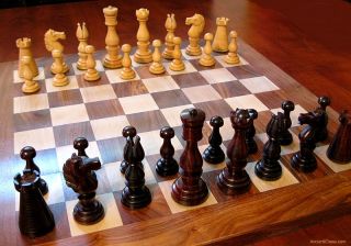 Rosewood Chess Men of Simpsons in The Strand Divan 19th C Style Set