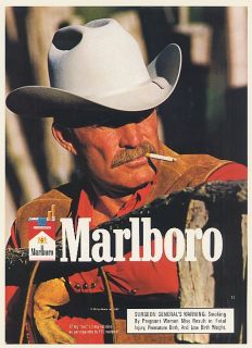 1989 Marlboro Cigarette Cowboy Man Smoking Leaning on Fence Print Ad