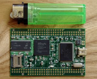 Size comparison of the USB FPGA Module 1.11a with Spartan 6 FPGA and